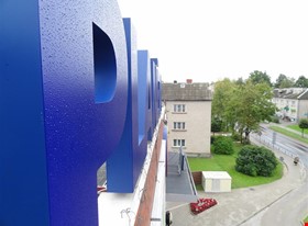 ART DEKO group - примеры работ: Gaismas burti uz ēkas jumta - фото №2